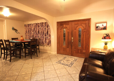 The spacious entry and dining room areas are welcoming in this vacation home.