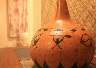 The traditional Hawaiian gourd is just one of several tropical elements that make up the decor of this vacation rental.